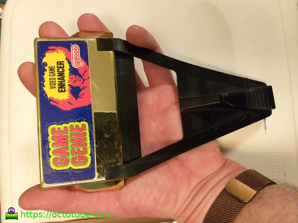 Game Genie in hand