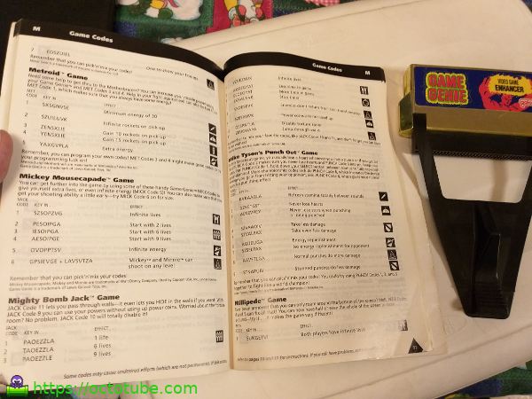 Game Genie with open book