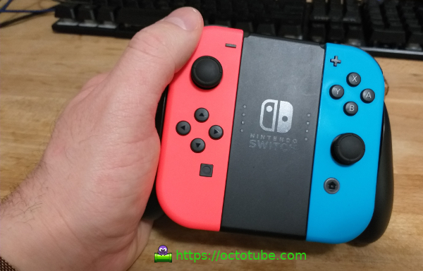 Joy-Con with the grip in hand